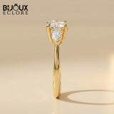 Three-Stone Mixed-Cut Ring in Polished Gold, Blending Round Fire with Sleek Teardrop Geometry - Bijoux Eclore