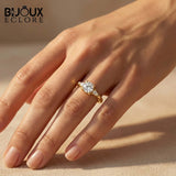 Three-Stone Mixed-Cut Ring in Polished Gold, Blending Round Fire with Sleek Teardrop Geometry - Bijoux Eclore