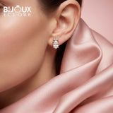 Oval Cut Diamond Earrings with Delicate Round Diamond Accents - Bijoux Eclore