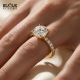 Round-Cut Diamond Engagement Ring with a Brilliant Gold Band and Sparkling Accents - Bijoux Eclore