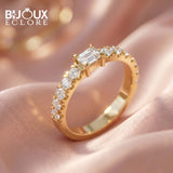 Gold Diamond Ring with Emerald Cut Center and Round Pavé Band - Bijoux Eclore