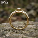 Round-Cut Diamond Surrounded by Pavé Diamonds Set in a Stunning Yellow Gold Band - Bijoux Eclore