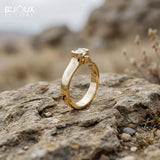 Round Diamond Set Between Two Sparkling Accents on a Beautiful Gold Band - Bijoux Eclore