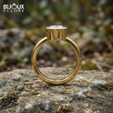 Round-Cut Diamond Surrounded by a Polished Gold Bezel on a Simple, Elegant Band - Bijoux Eclore