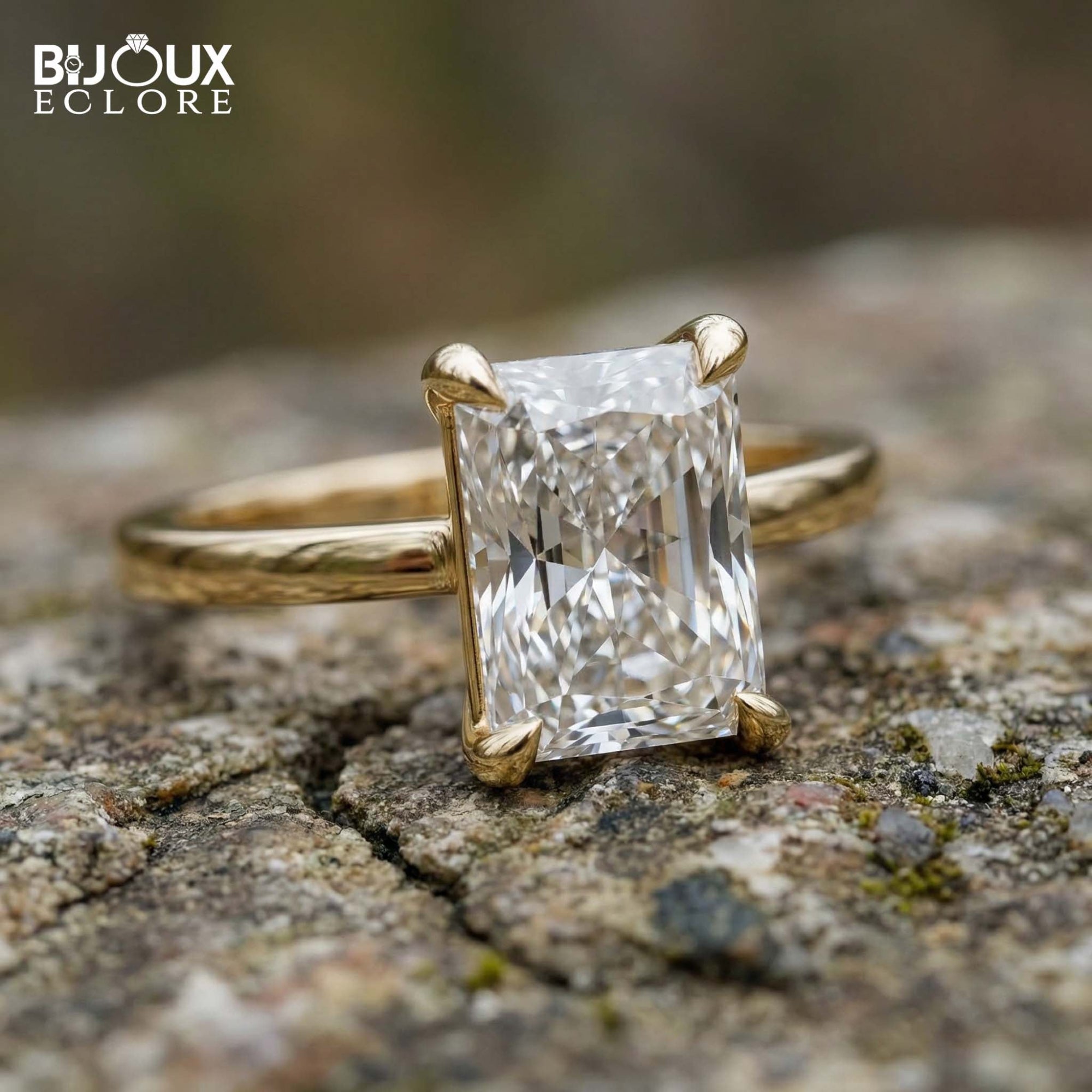 Emerald-Cut Diamond Set in a Classic Yellow Gold Band for a Refined and Elegant Look - Bijoux Eclore