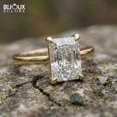 Emerald-Cut Diamond Set in a Classic Yellow Gold Band for a Refined and Elegant Look - Bijoux Eclore