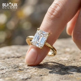 Emerald-Cut Diamond Set in a Classic Yellow Gold Band for a Refined and Elegant Look - Bijoux Eclore