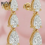 Vertical Masterpiece Featuring Three Stacked Pear-Cut Brilliance Stones in a Seamless Prong Setting Earrings - Bijoux Eclore