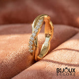 Elegant Gold Twisted Diamond Ring for Women with Modern Crossover Band and Round Brilliant Stones - Bijoux Eclore