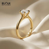 Solitaire Round-Cut Diamond Engagement Ring with a Polished Yellow Gold Band - Bijoux Eclore
