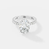 Elegant Oval-Cut Lab-Grown Diamond Engagement Ring with Round Accent Stones - Bijoux Eclore