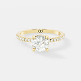 Exquisite Rose Gold Engagement Ring Featuring a Brilliant Round Cut Center Diamond and a Pavé Diamond - Bijoux Eclore