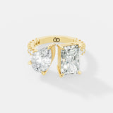 Exquisite Two-Stone Gold Ring Featuring a Pear-Cut and Emerald-Cut Diamond with Delicate Pavé - Bijoux Eclore