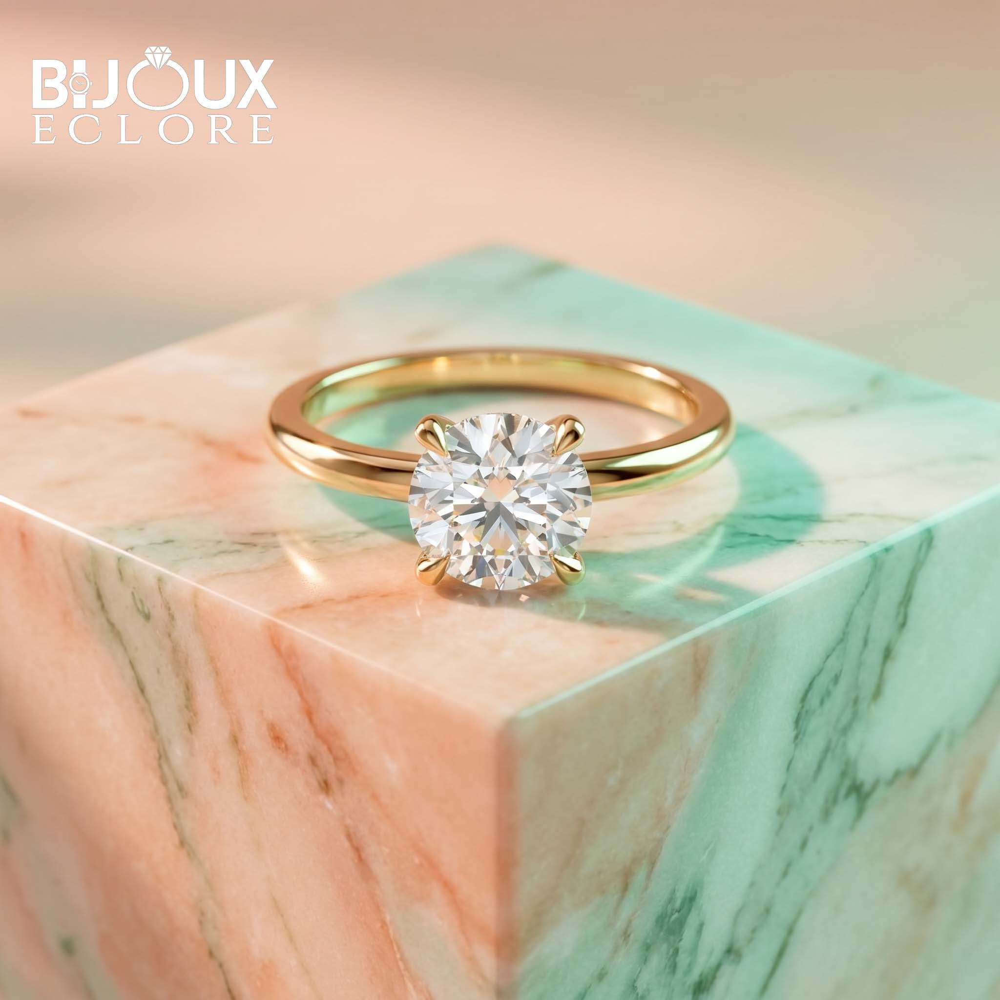 Classic Yellow Gold Solitaire Diamond Ring with Round Cut Center Stone and High-Set Prong Detail - Bijoux Eclore