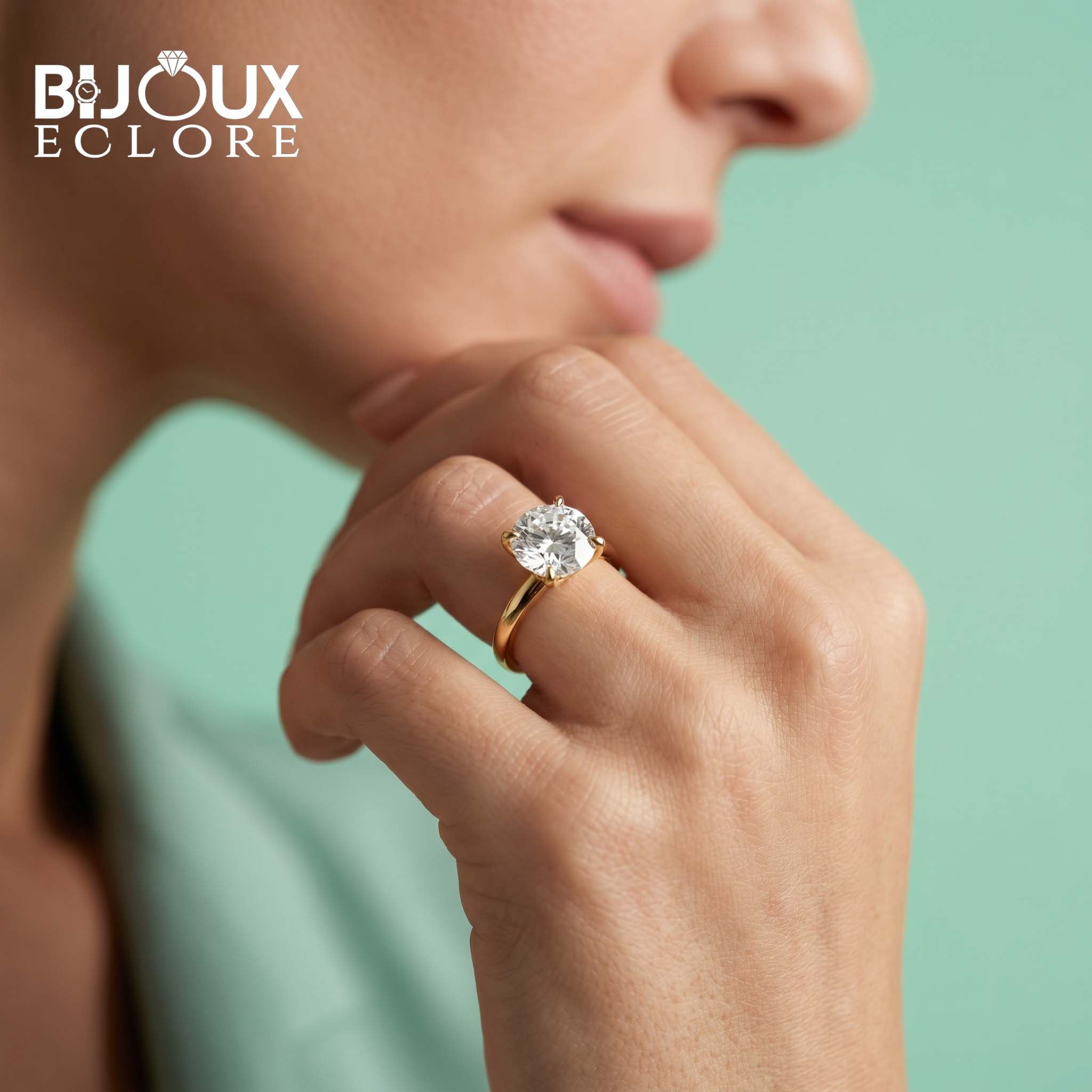 Classic Yellow Gold Solitaire Diamond Ring with Round Cut Center Stone and High-Set Prong Detail - Bijoux Eclore
