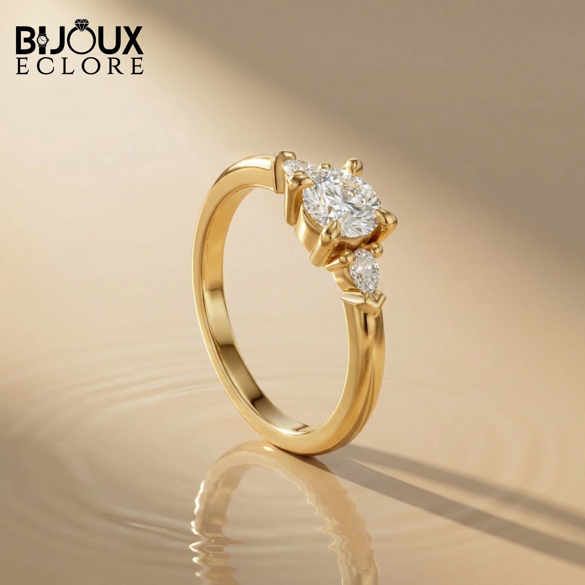 Three-Stone Mixed-Cut Ring in Polished Gold, Blending Round Fire with Sleek Teardrop Geometry - Bijoux Eclore