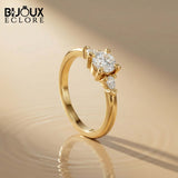 Three-Stone Mixed-Cut Ring in Polished Gold, Blending Round Fire with Sleek Teardrop Geometry - Bijoux Eclore