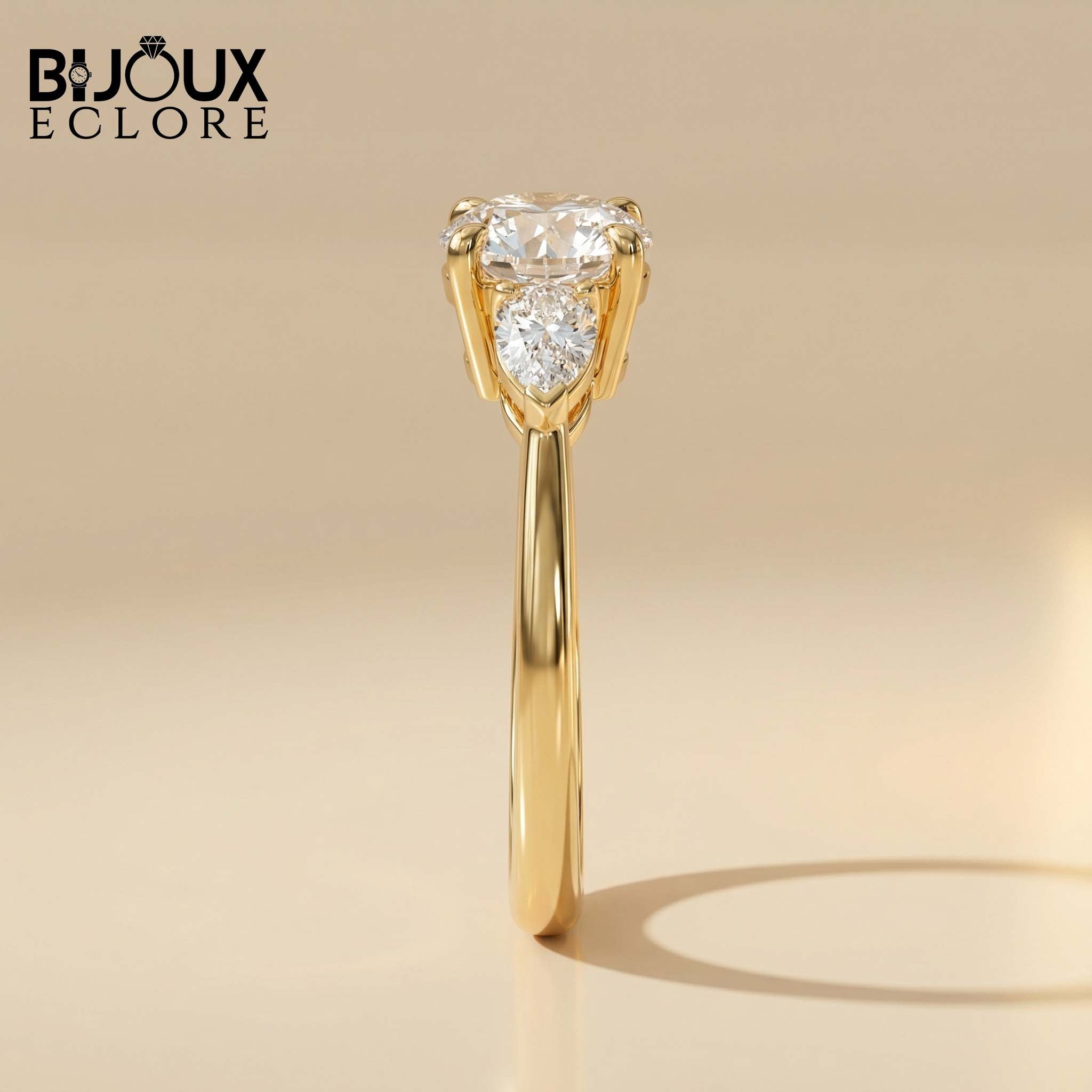 Three-Stone Mixed-Cut Ring in Polished Gold, Blending Round Fire with Sleek Teardrop Geometry - Bijoux Eclore