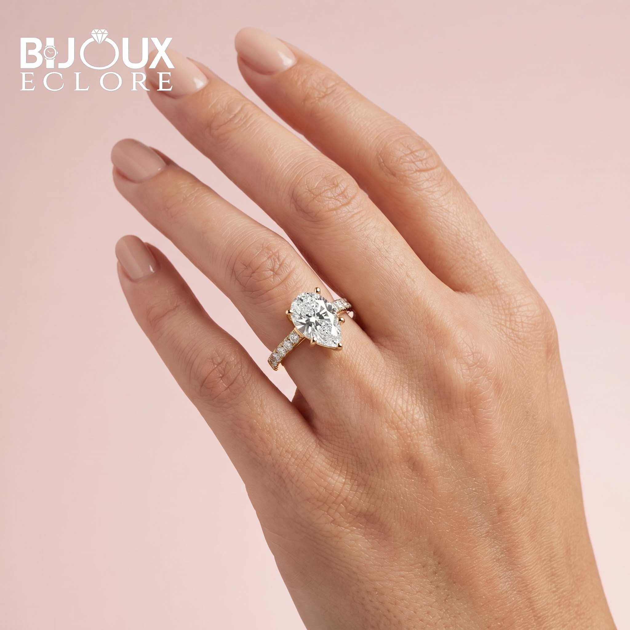 Gold Pear Cut Diamond Ring with Shared-Prong Accent Stones - Bijoux Eclore