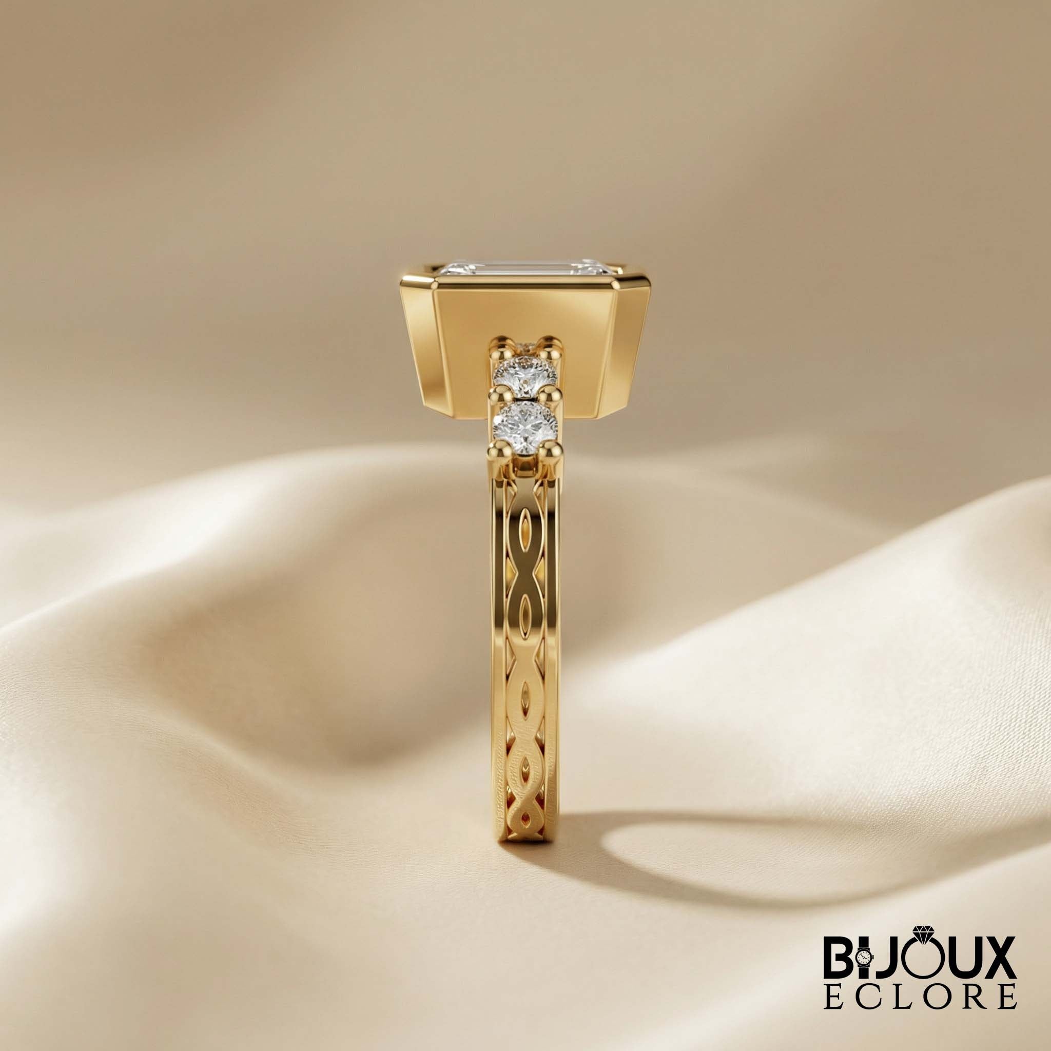 Diamond Ring with an Emerald-Cut Centerpiece and Timeless Gold Detailing - Bijoux Eclore