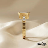 Diamond Ring with an Emerald-Cut Centerpiece and Timeless Gold Detailing - Bijoux Eclore
