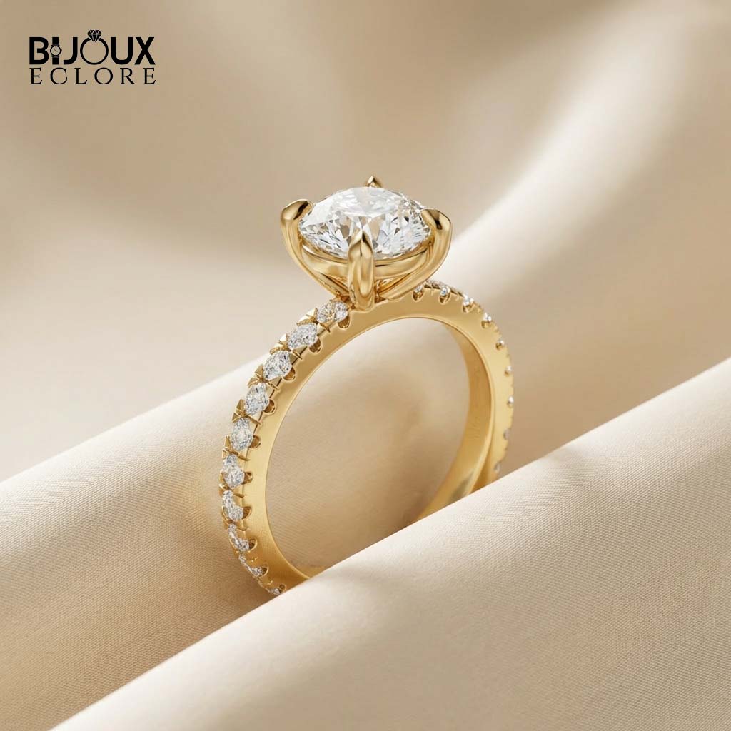 Round-Cut Diamond Engagement Ring with a Brilliant Gold Band and Sparkling Accents - Bijoux Eclore