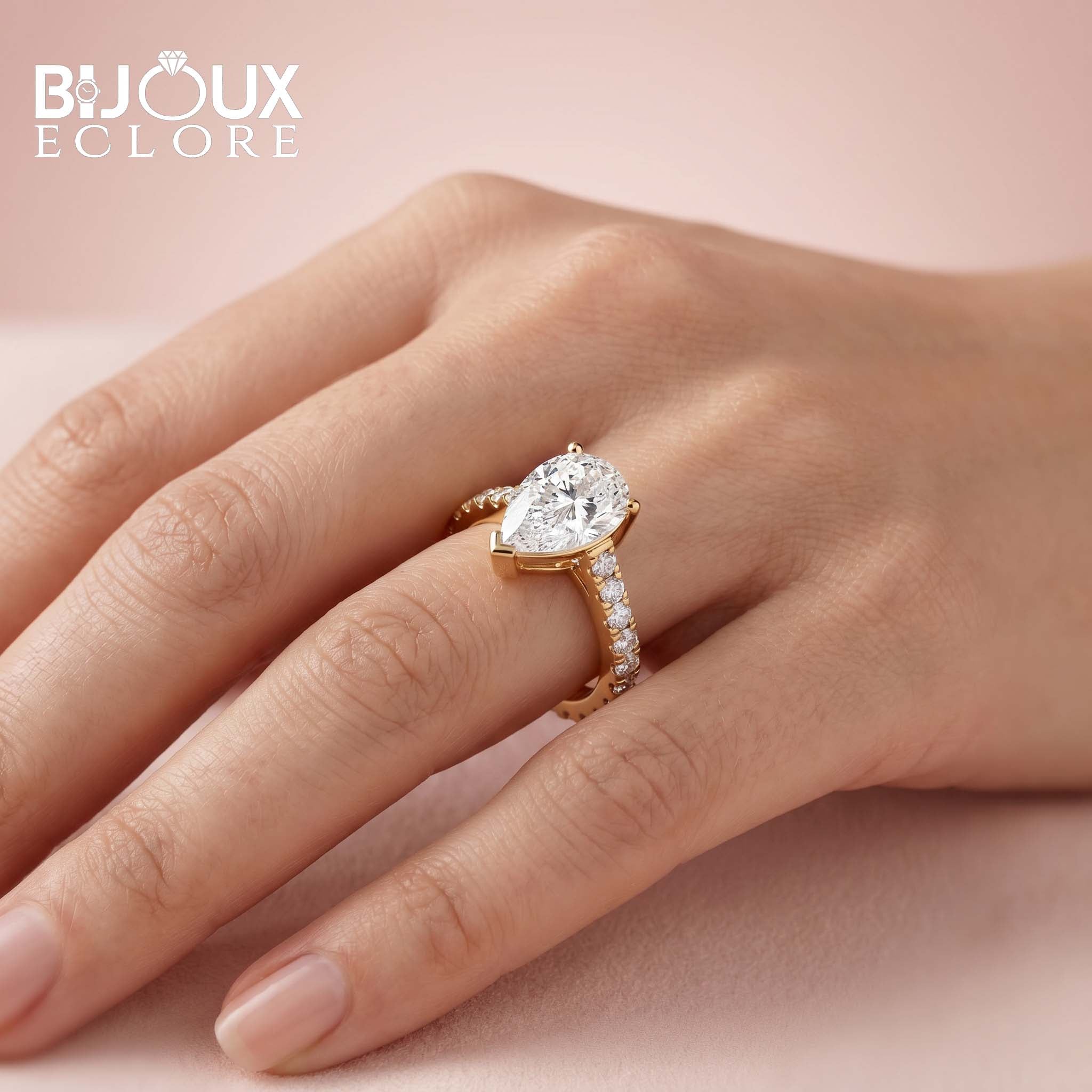 Pear-Shaped Diamond Statement Ring in Yellow Gold with Diamond Side Accents - Bijoux Eclore