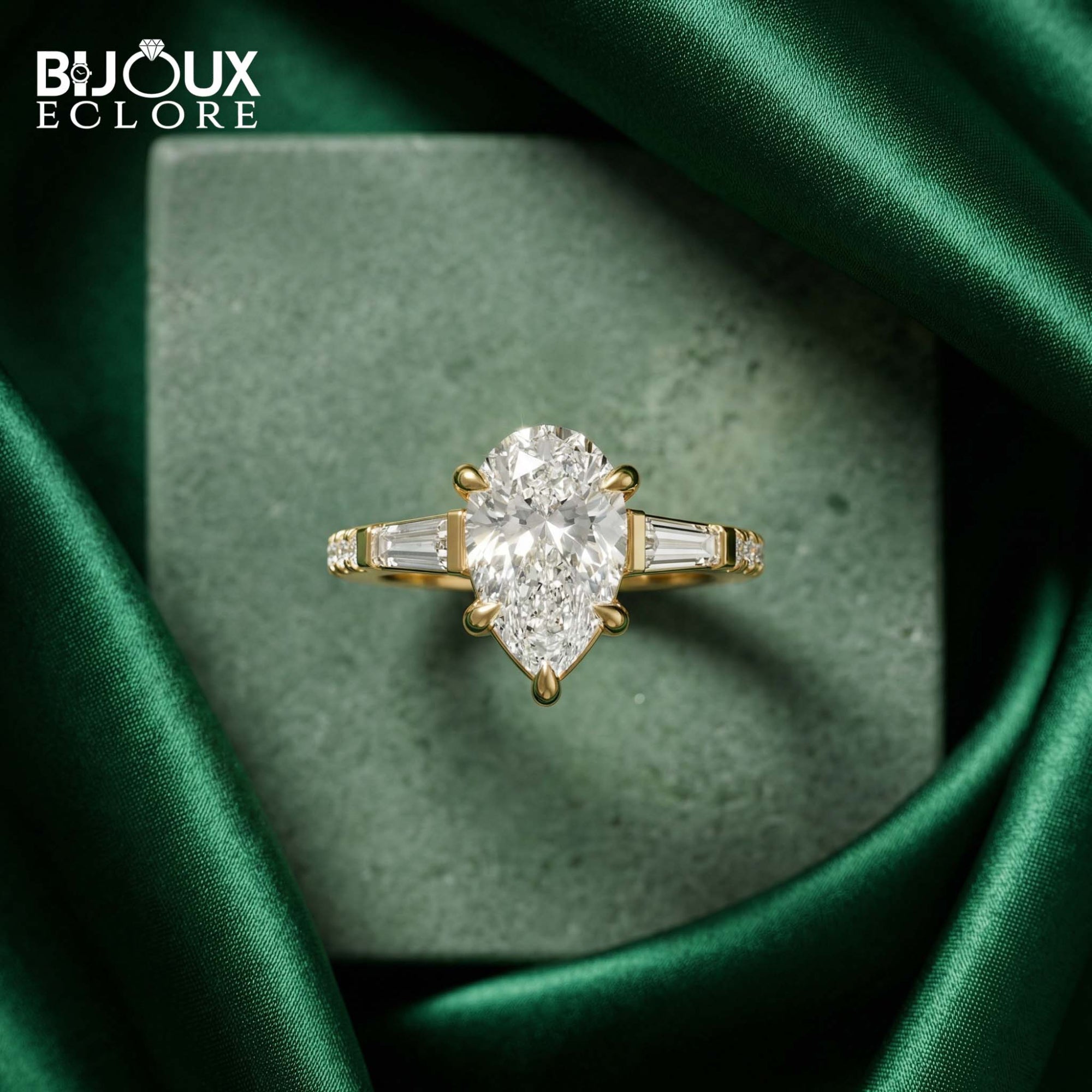 Luxury Pear Cut Diamond Ring with Tapered Baguette Side Stones in Polished Gold - Bijoux Eclore