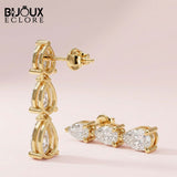 Vertical Masterpiece Featuring Three Stacked Pear-Cut Brilliance Stones in a Seamless Prong Setting Earrings - Bijoux Eclore