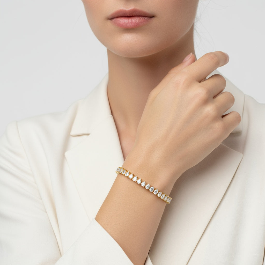 Exquisite Cut Diamond Tennis Bracelet – A Dazzling Symphony of 41 Brilliant Pear-Shaped Diamonds Set in a Timeless Design, Celebrating Radiant Luxury, Graceful Fluidity, and Unparalleled Sophistication - Bijoux Eclore