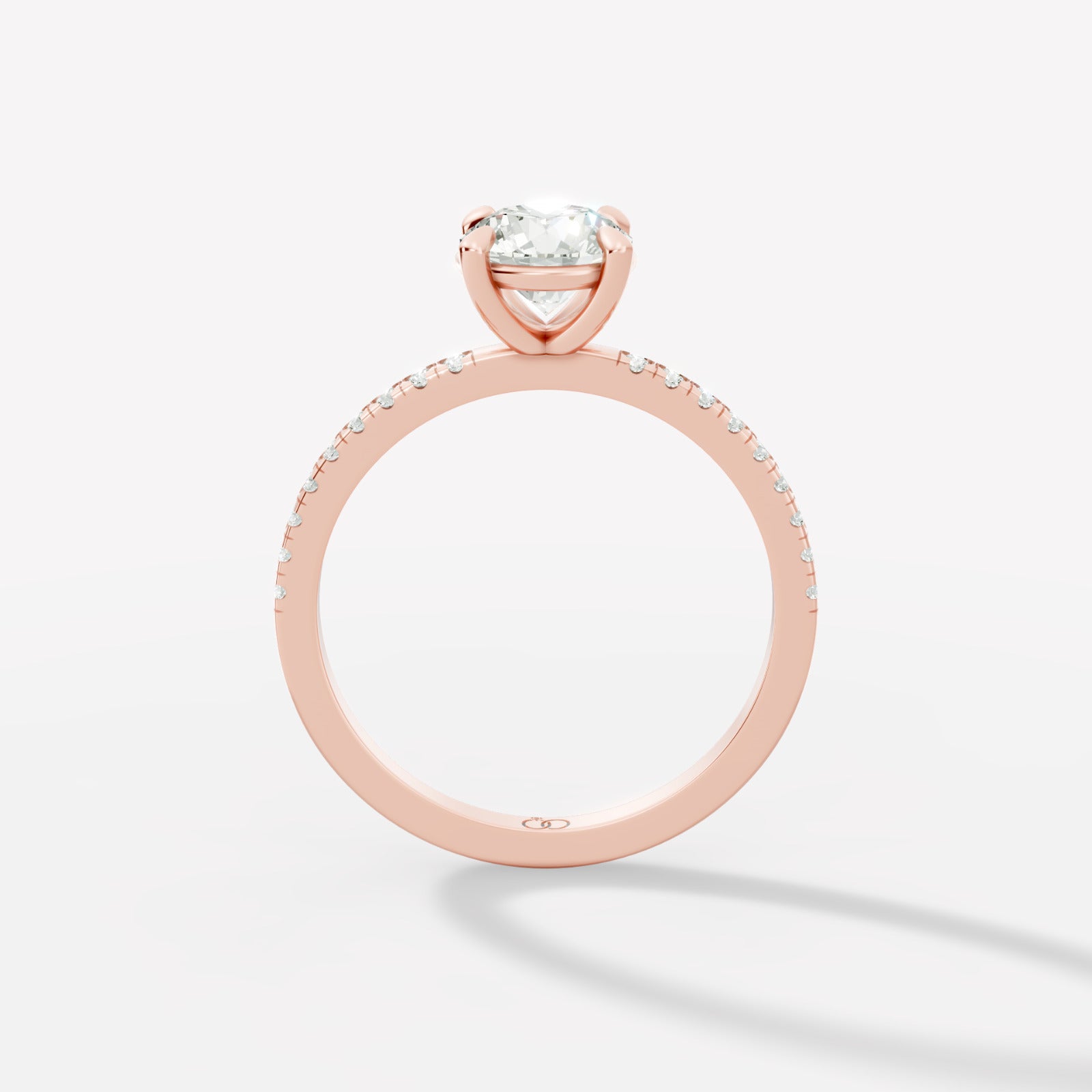 Exquisite Rose Gold Engagement Ring Featuring a Brilliant Round Cut Center Diamond and a Pavé Diamond - Bijoux Eclore