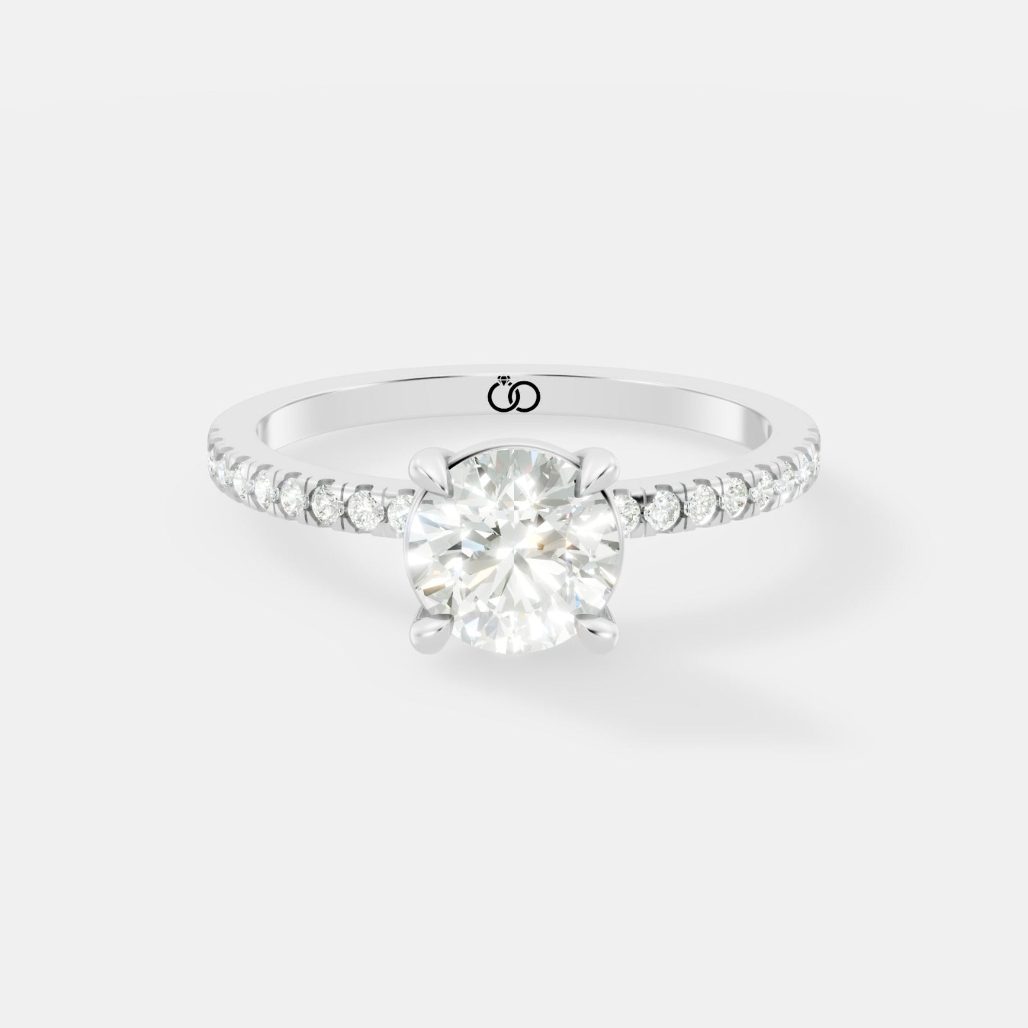 Exquisite Rose Gold Engagement Ring Featuring a Brilliant Round Cut Center Diamond and a Pavé Diamond - Bijoux Eclore