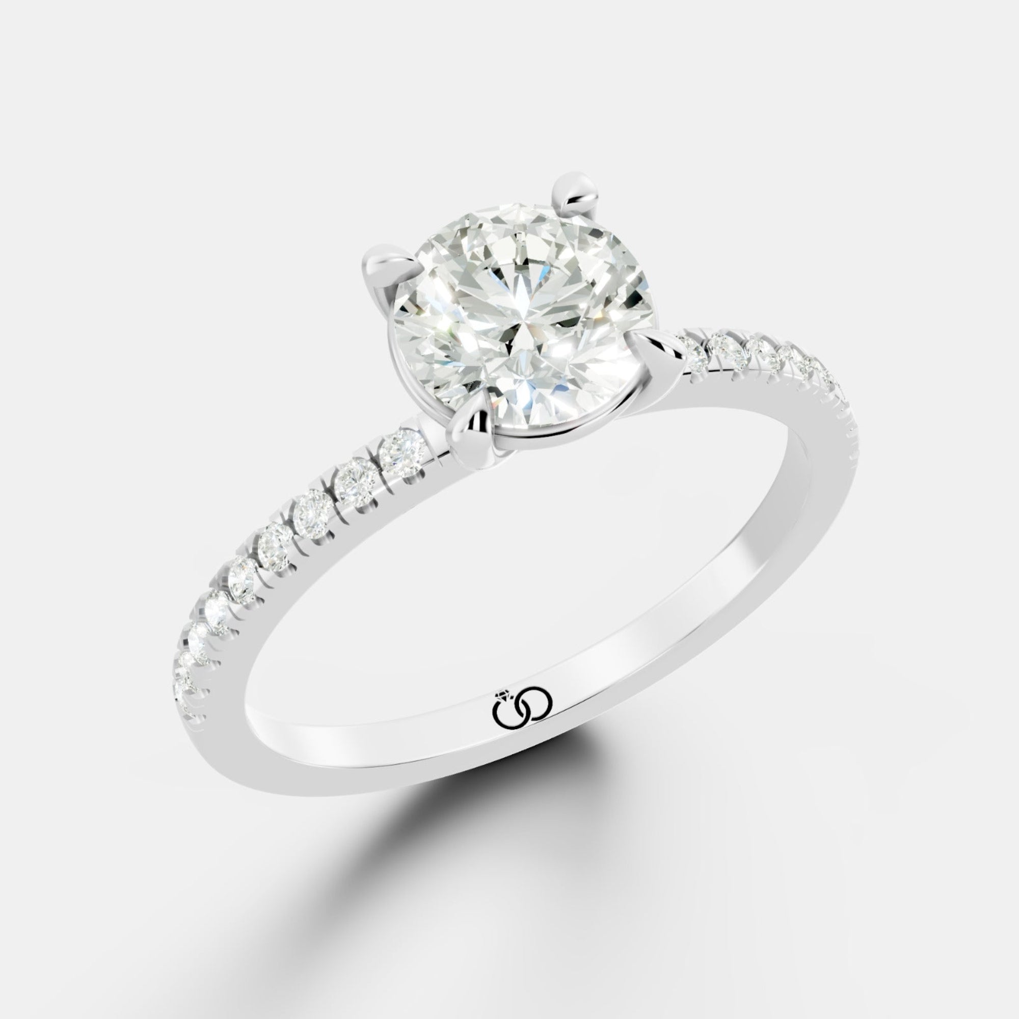 Exquisite Rose Gold Engagement Ring Featuring a Brilliant Round Cut Center Diamond and a Pavé Diamond - Bijoux Eclore