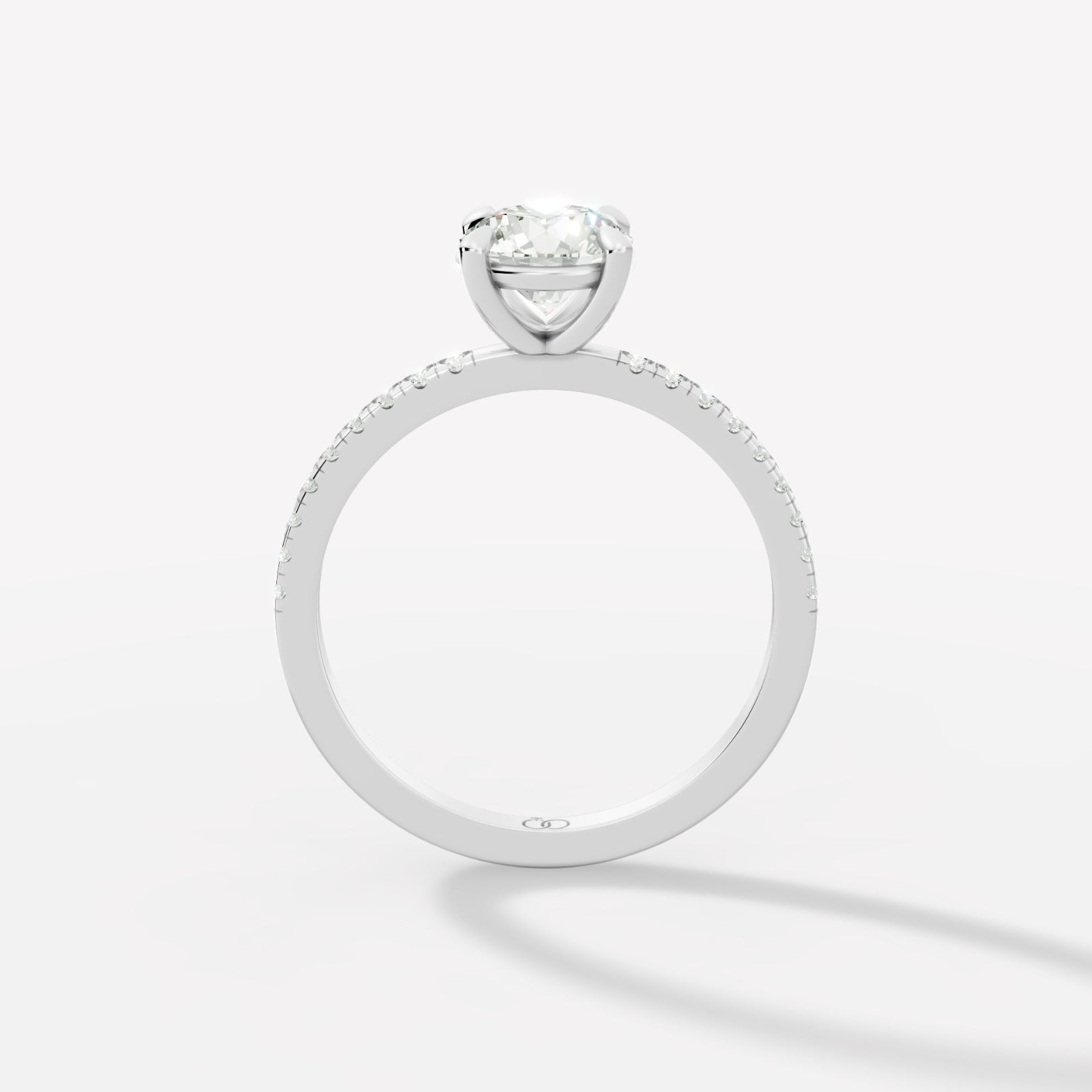 Exquisite Rose Gold Engagement Ring Featuring a Brilliant Round Cut Center Diamond and a Pavé Diamond - Bijoux Eclore