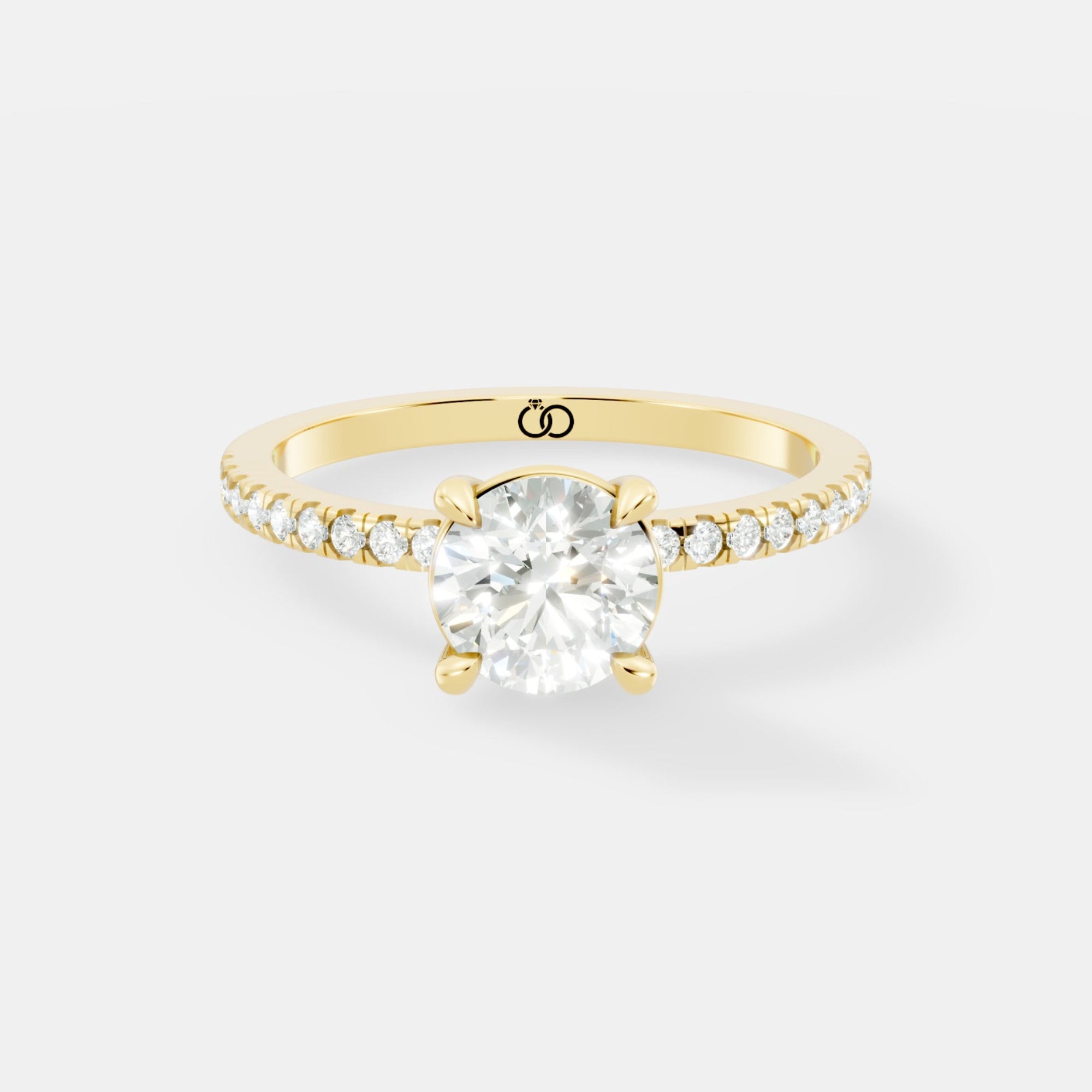 Exquisite Rose Gold Engagement Ring Featuring a Brilliant Round Cut Center Diamond and a Pavé Diamond - Bijoux Eclore