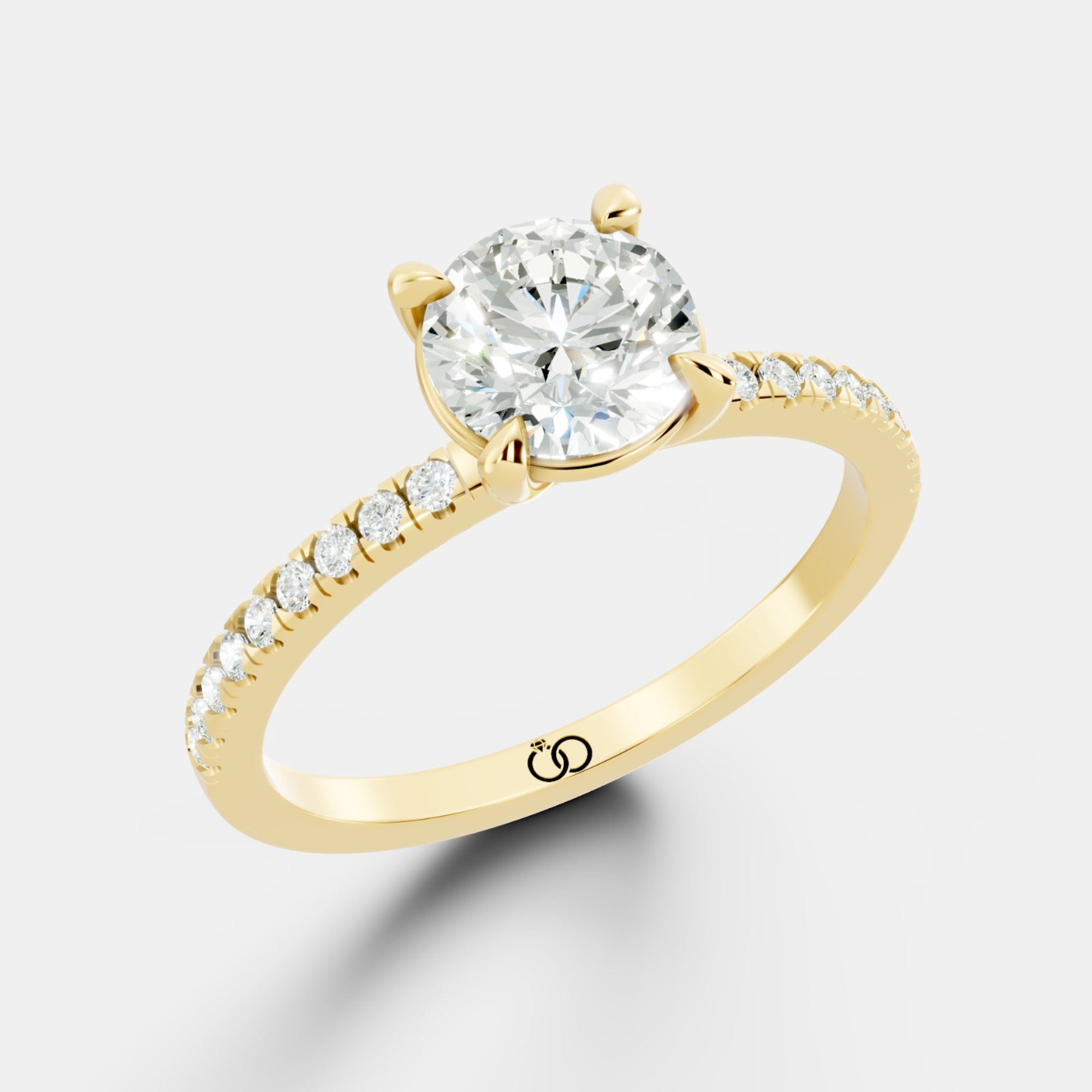 Exquisite Rose Gold Engagement Ring Featuring a Brilliant Round Cut Center Diamond and a Pavé Diamond - Bijoux Eclore