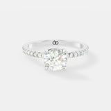 Exquisite Rose Gold Engagement Ring Featuring a Brilliant Round Cut Center Diamond and a Pavé Diamond - Bijoux Eclore