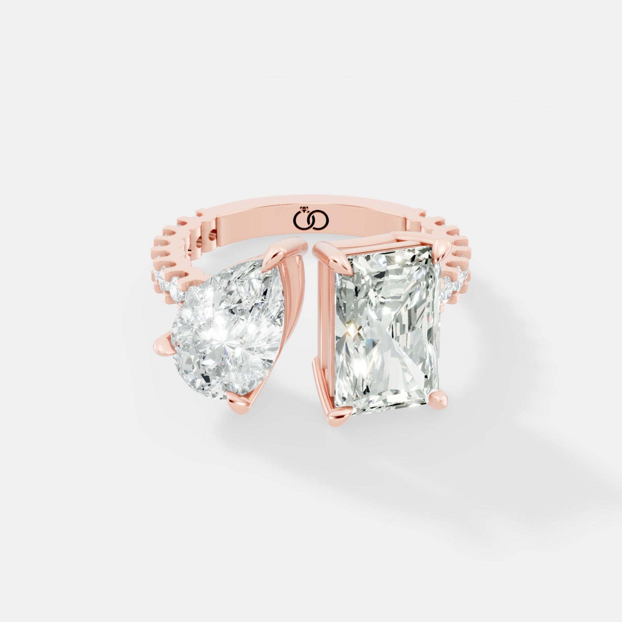 Exquisite Two-Stone Gold Ring Featuring a Pear-Cut and Emerald-Cut Diamond with Delicate Pavé - Bijoux Eclore