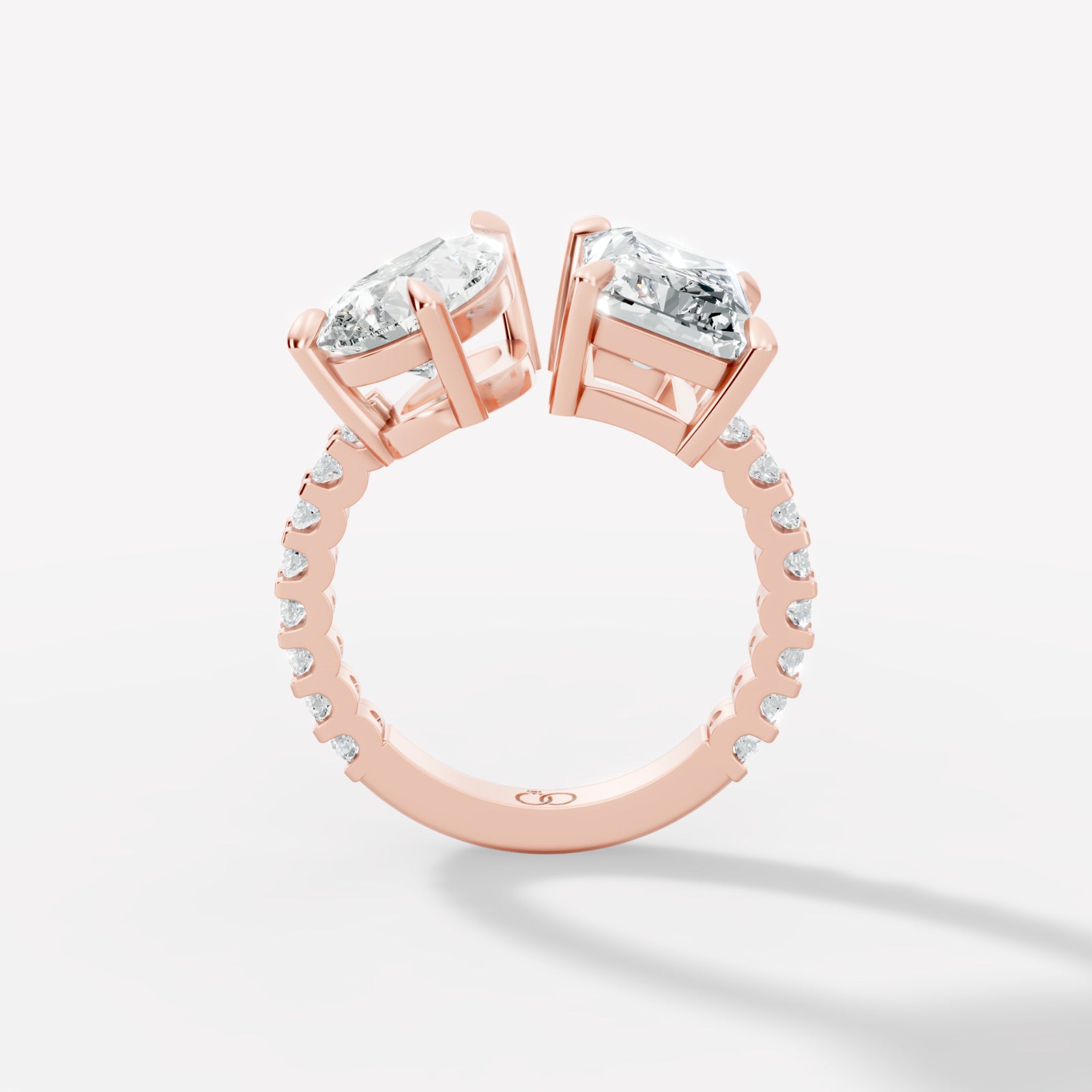 Exquisite Two-Stone Gold Ring Featuring a Pear-Cut and Emerald-Cut Diamond with Delicate Pavé - Bijoux Eclore