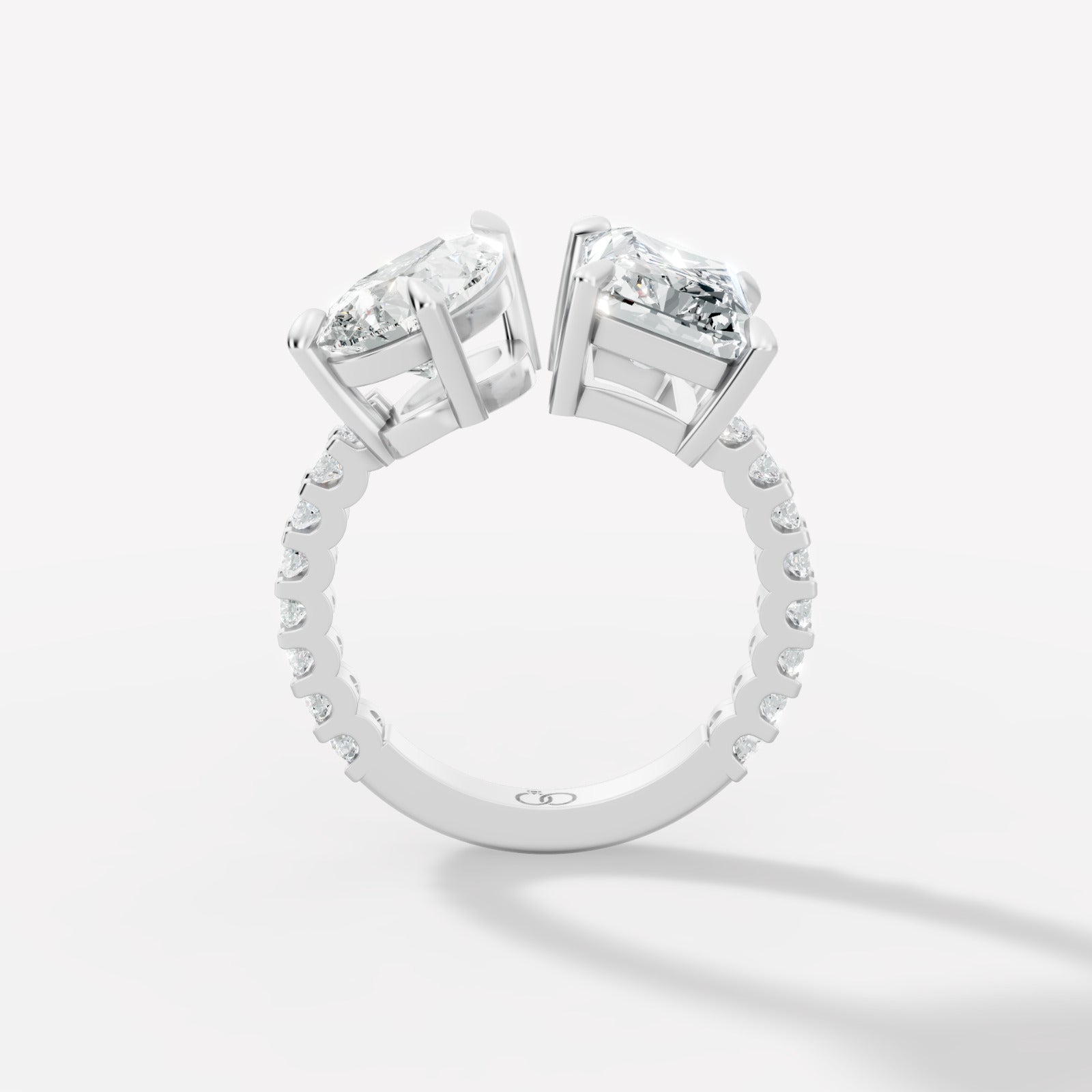 Exquisite Two-Stone Gold Ring Featuring a Pear-Cut and Emerald-Cut Diamond with Delicate Pavé - Bijoux Eclore