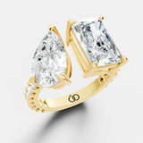Exquisite Two-Stone Gold Ring Featuring a Pear-Cut and Emerald-Cut Diamond with Delicate Pavé - Bijoux Eclore