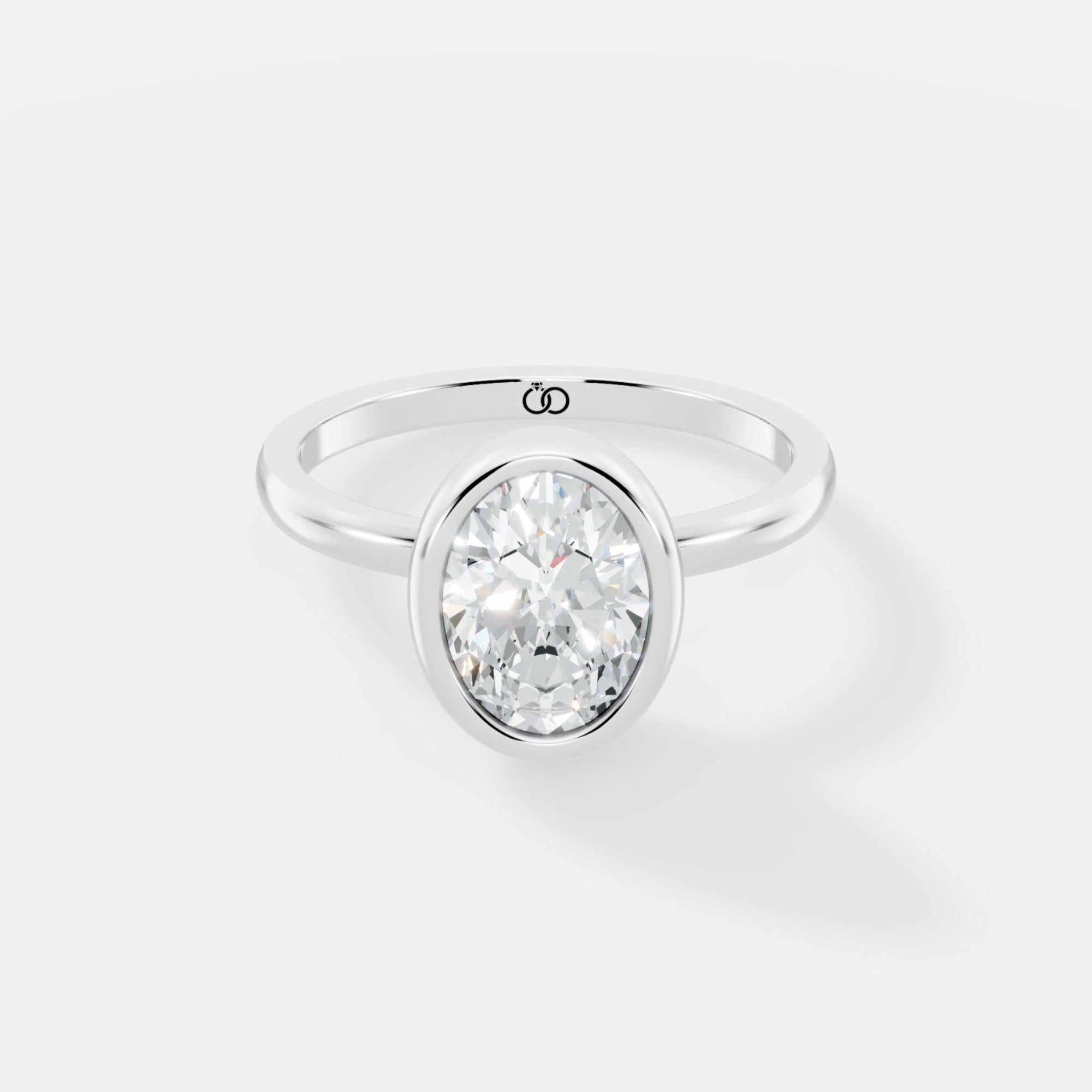 Classic Bezel-Set Oval Lab-Grown Diamond Solitaire Ring – Minimalist Elegance with a Modern Twist - Bijoux Eclore