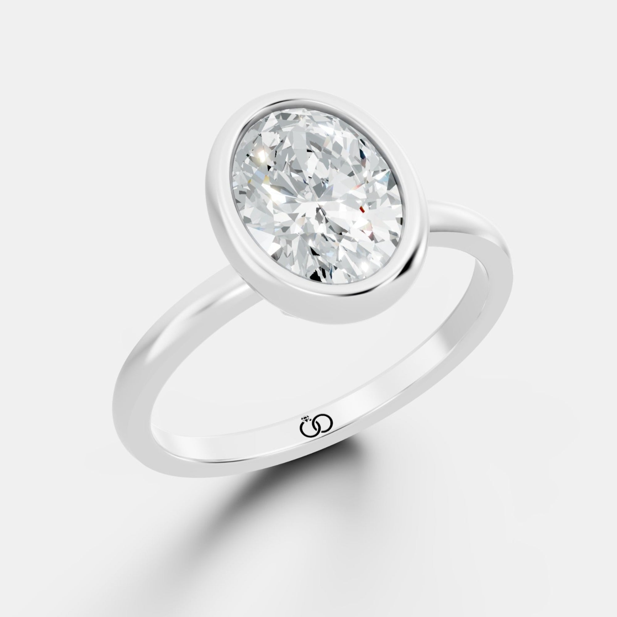 Classic Bezel-Set Oval Lab-Grown Diamond Solitaire Ring – Minimalist Elegance with a Modern Twist - Bijoux Eclore