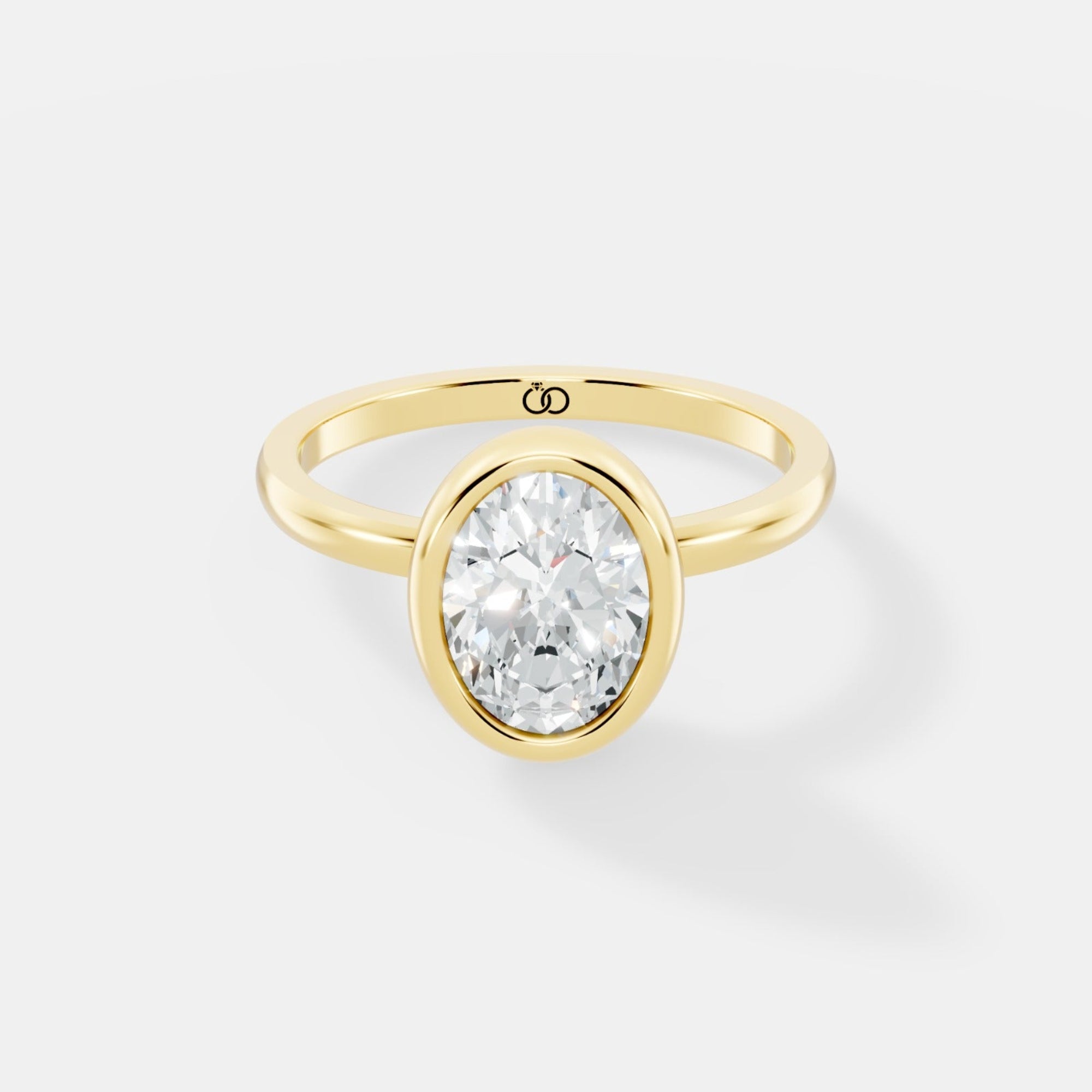 Classic Bezel-Set Oval Lab-Grown Diamond Solitaire Ring – Minimalist Elegance with a Modern Twist - Bijoux Eclore
