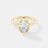 Classic Bezel-Set Oval Lab-Grown Diamond Solitaire Ring – Minimalist Elegance with a Modern Twist - Bijoux Eclore