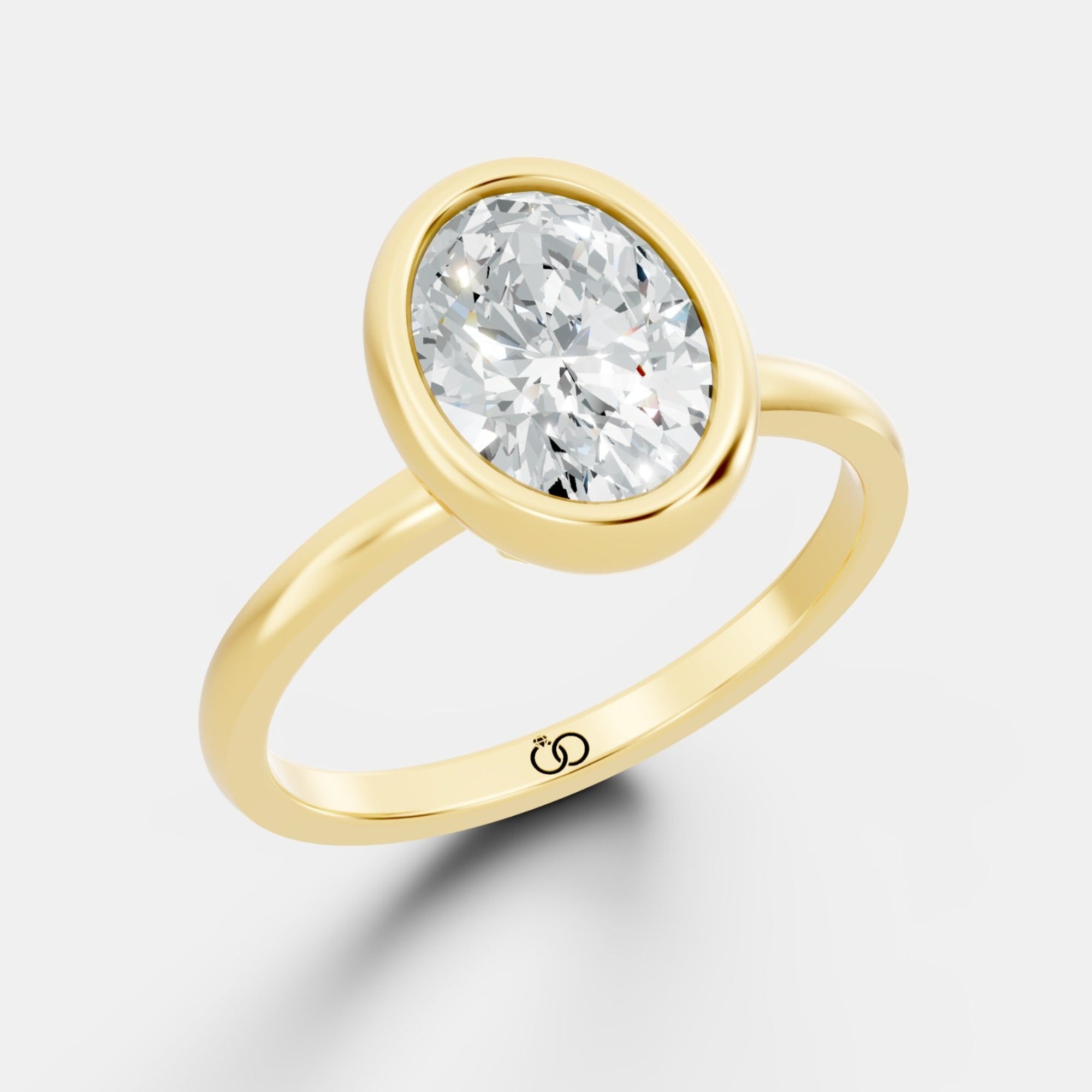 Classic Bezel-Set Oval Lab-Grown Diamond Solitaire Ring – Minimalist Elegance with a Modern Twist - Bijoux Eclore
