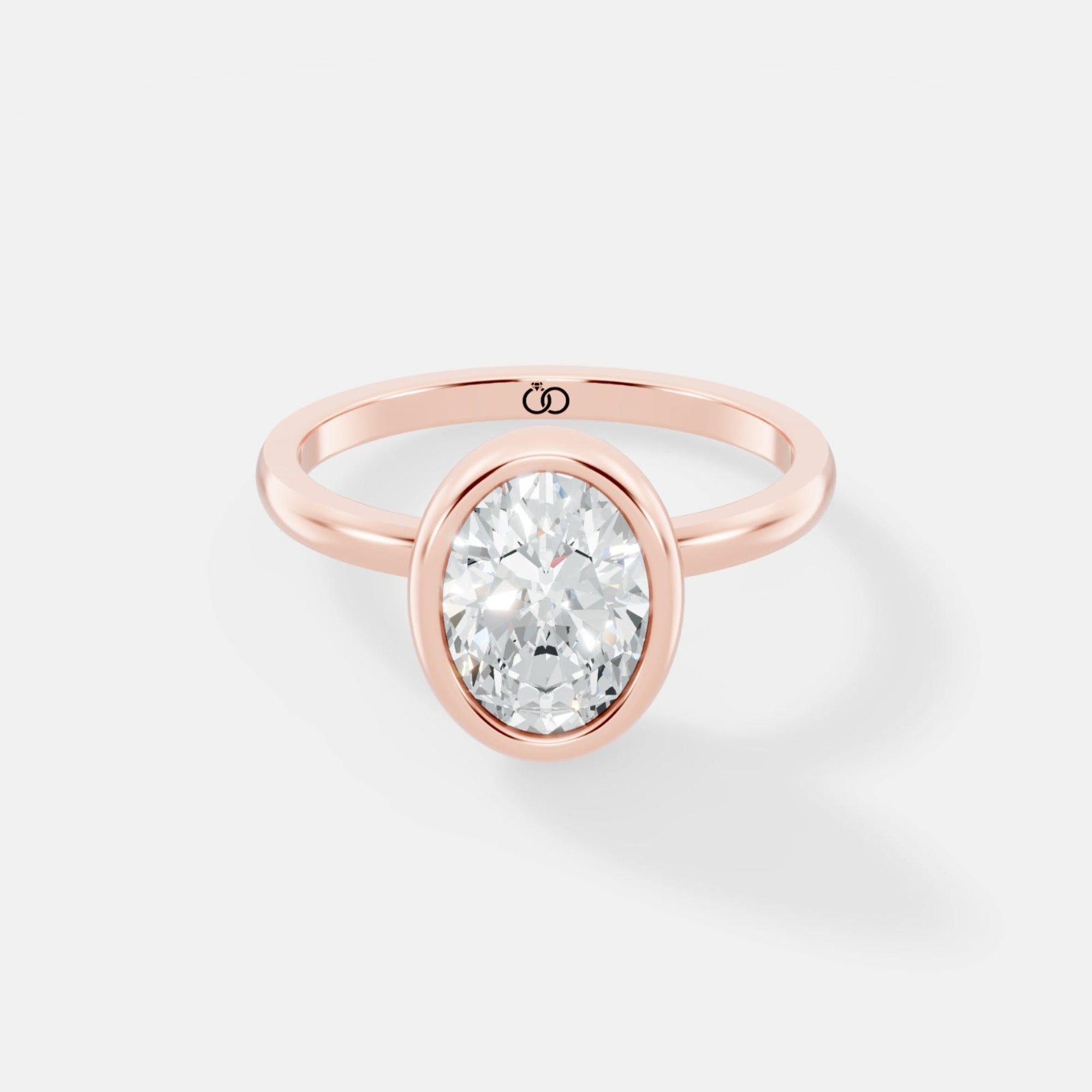 Classic Bezel-Set Oval Lab-Grown Diamond Solitaire Ring – Minimalist Elegance with a Modern Twist - Bijoux Eclore