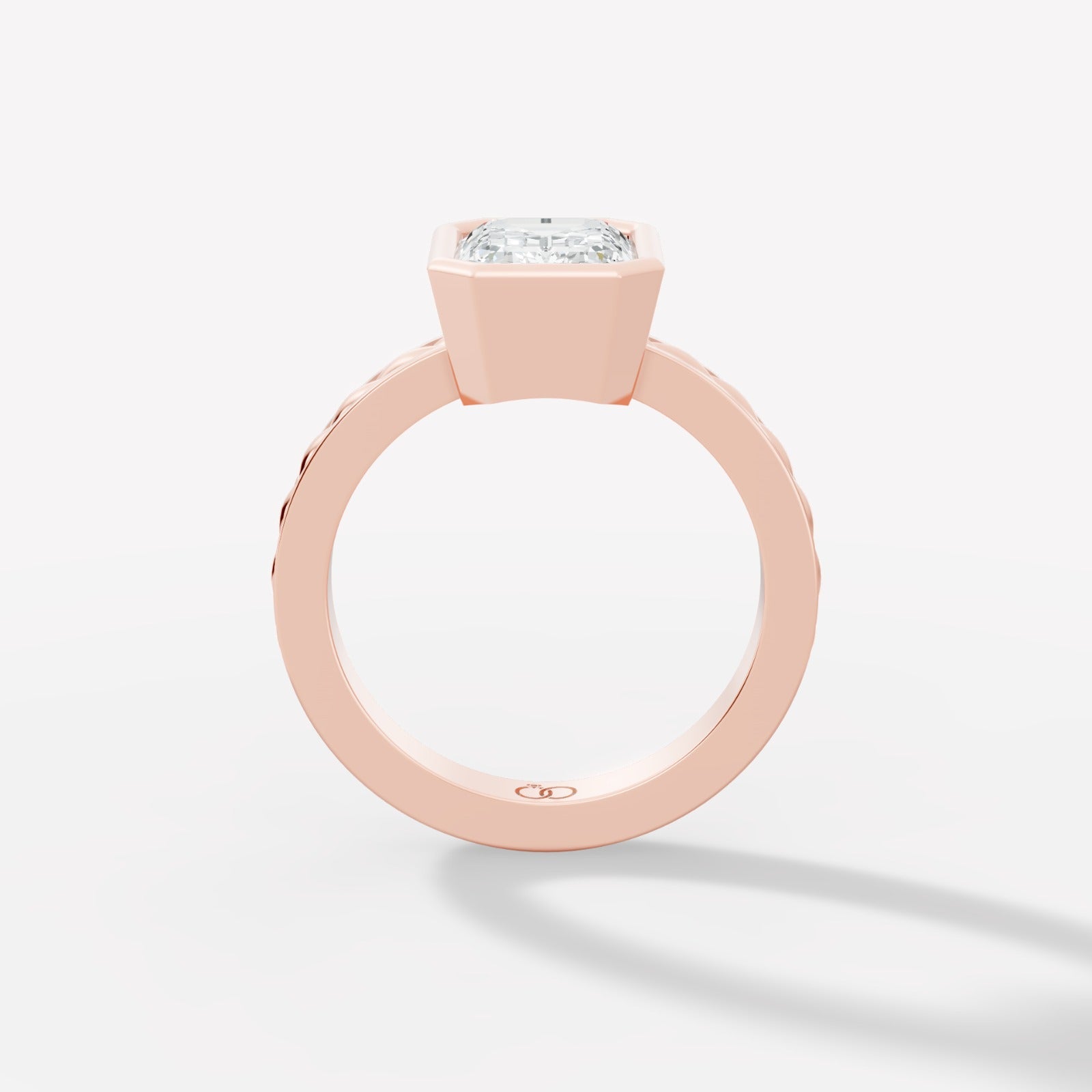 Captivating Emerald-Cut Lab-Grown Diamond Ring Framed in a Sleek Bezel Setting - Bijoux Eclore