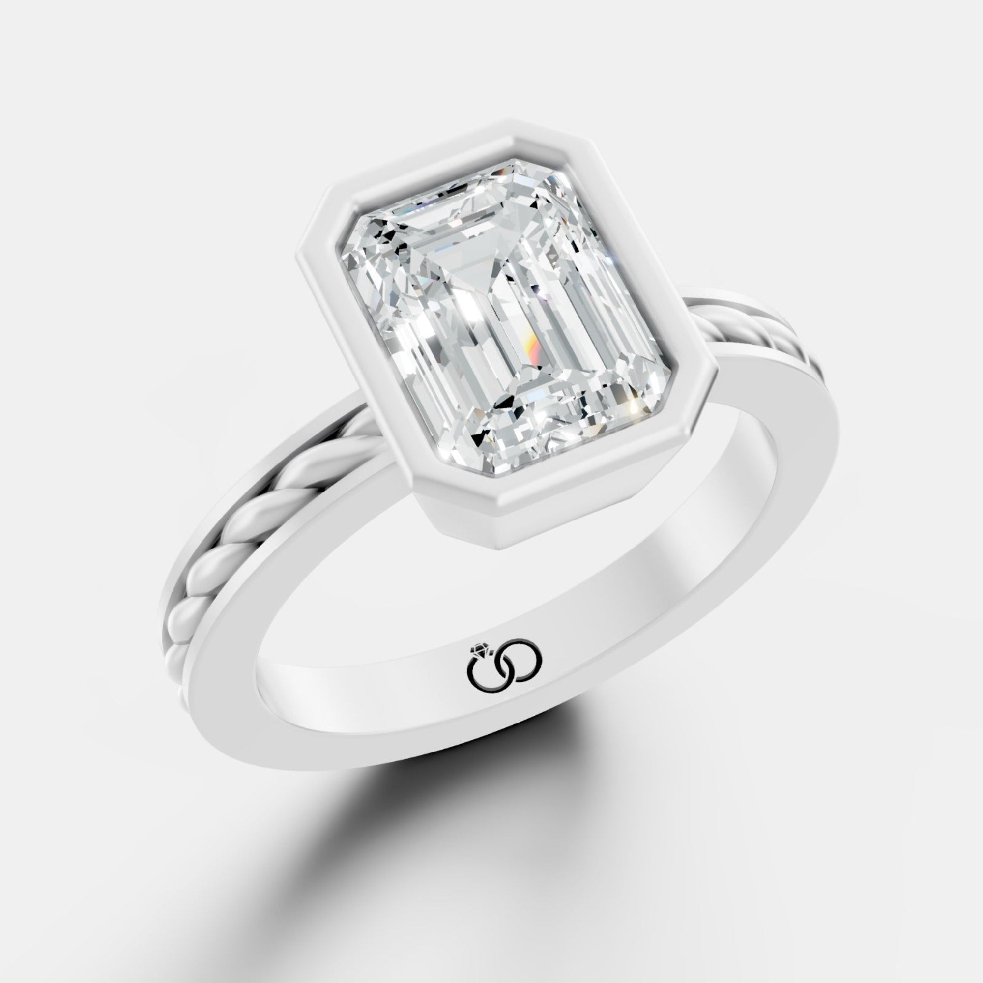 Captivating Emerald-Cut Lab-Grown Diamond Ring Framed in a Sleek Bezel Setting - Bijoux Eclore