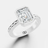 Captivating Emerald-Cut Lab-Grown Diamond Ring Framed in a Sleek Bezel Setting - Bijoux Eclore